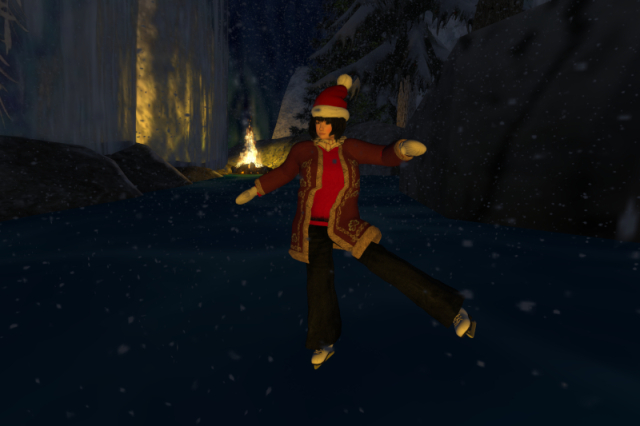 Me doing a pirouette while ice-skating on a frozen lake in the dark with a campfire in the background