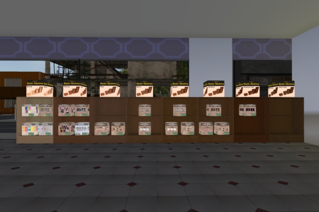 The second image described in the post text. It is a shaded, non-ray-traced digital rendering from inside a 3-D virtual world, Dorenas World, that shows the inside of a department store with eight box shelf units made of different sorts of wood with three shelves each, lined up in a row. Except for the rightmost unit, all of them carry at least one item and at most four inside. Each one of them carries a box with the same type of shelves in four sizes on the top shelf. All items were either created or upgraded by me. A more detailed description including explanations and transcriptions of the writings on the boxes can be found in the post text. If you are on Mastodon, the post text with the full image descriptions is above, concealed behind a content warning. If you are on Friendica, Hubzilla or (streams), the image descriptions follow right below.