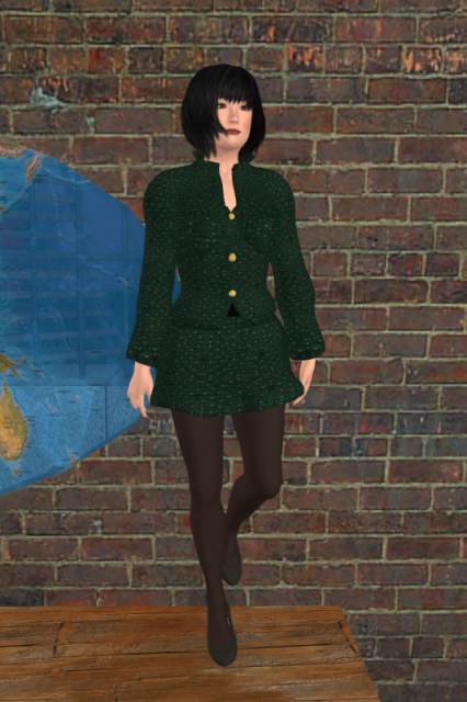 Me doing an Irish dance on the bar counter of Gulliver's, wearing a green jacket over a black top, a short green skirt, black nylon tights and black flats.