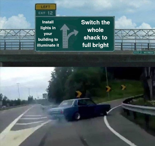 A car is drifting onto a highway exit ramp with smoking rear wheels. Above it is a bridge with a sign which reads "Install lights in your building to illuminate it" for the highway itself and "Switch the whole shack to full bright" for the exit ramp.