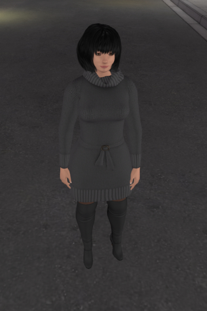 Me in the same outfit, but this time standing on a street and photographed from a slightly raised point of view; the asphalt is almost the same colour as my dress