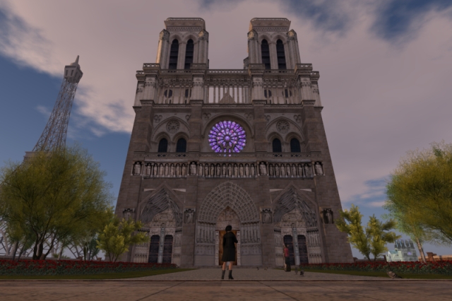 Me standing in front of the virtual representation of Notre-Dame in Little Paris