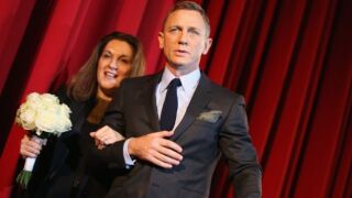 _Barbara Broccoli, seen here with actor Daniel Craig, has co-produced eight Bond films_gettyimages-494721234.jpg